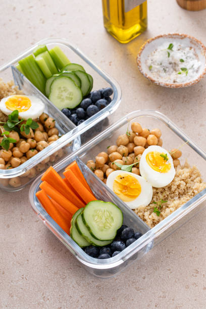 istock Vegetarian lunch meal prep containers high protein with quinoa, herbed chickpeas, vegetables and eggs 1978756195