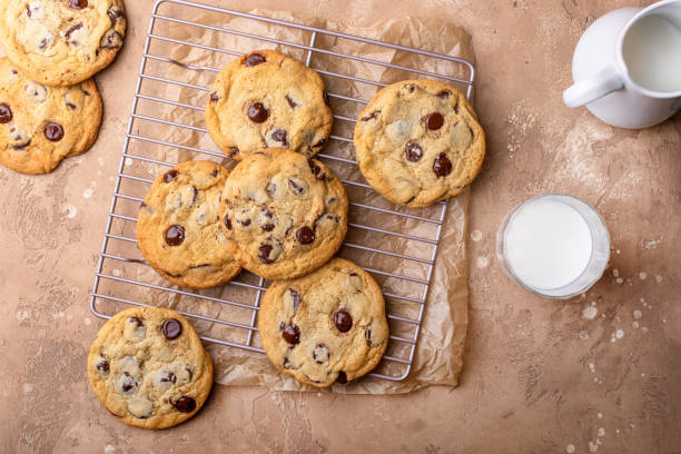 istock Chocolate chip cookies freshly baked on parchment paper 1978764014