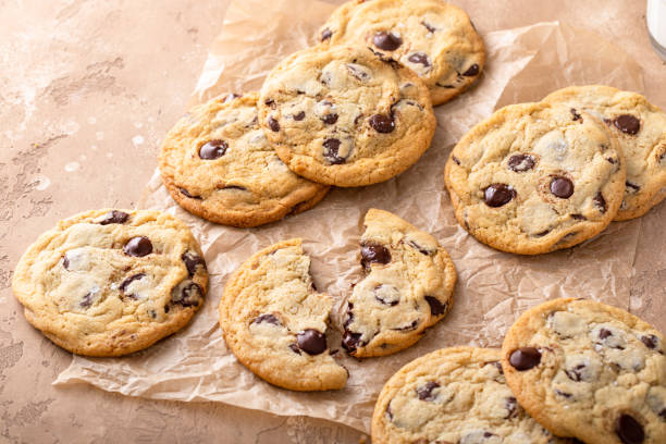 istock Chocolate chip cookies freshly baked on parchment paper 1978764029