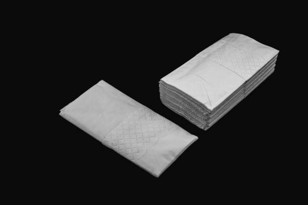 istock set of white napkins on a black background 1978766164