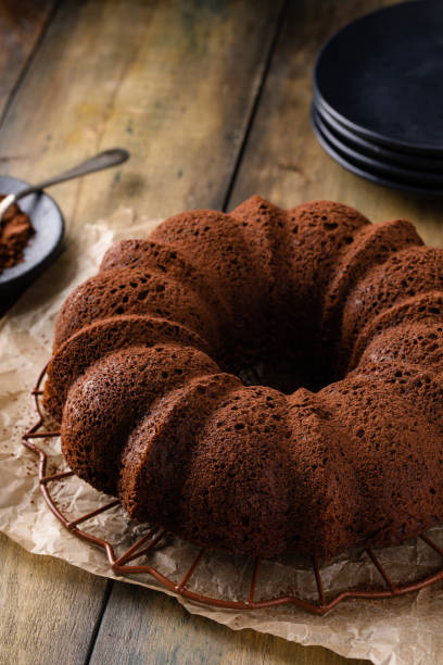istock Chocolate bundt cake dusted with cocoa powder 1978780739