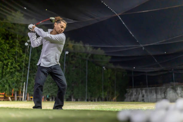 istock Male at golf center 1978803318