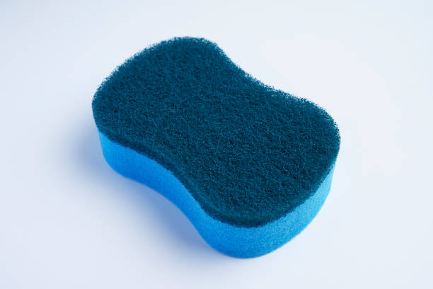 istock A blue dishwashing scrubber made with different materials on the top and bottom 1978810454