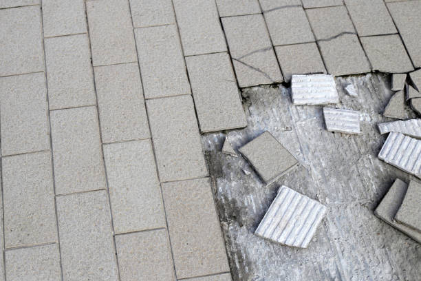 istock Cracked brown tiles on cement floor 1978890367