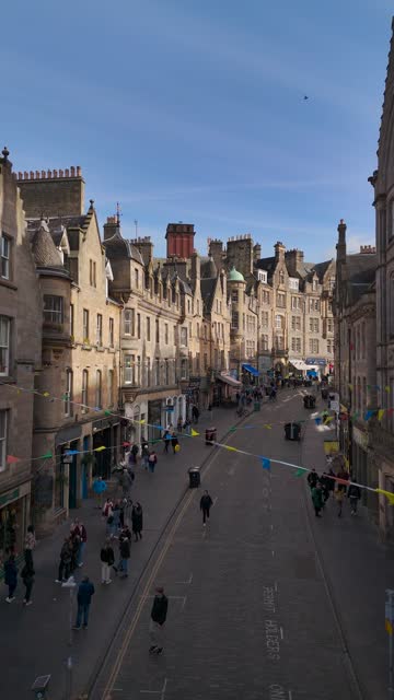 Aerial view of the famous Cockburn street in the Old Town of Edinburgh, Scotland, England, Cockburn Street in the United Kingdom, Cockburn street in the old town of Edinburgh Scotland England, crowds of tourists in the City of Harry Potter