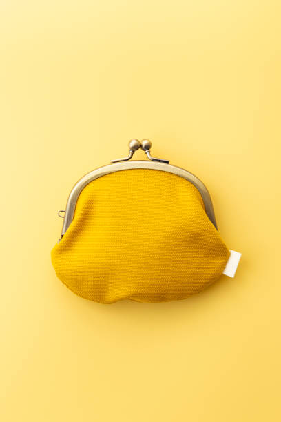 istock Coin purse on a yellow background. 1978912190