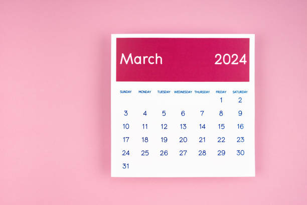 istock calendar page March 2024 on pink background. 1978927451