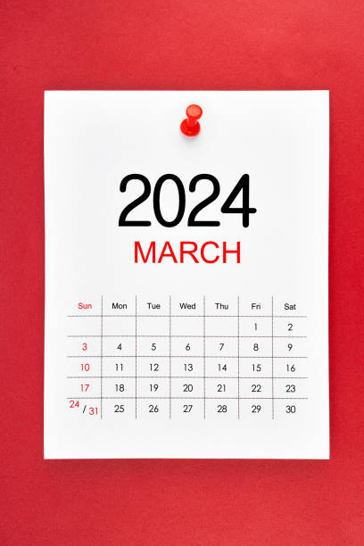 istock A March 2024 calendar page with push pin on red background. 1978927463