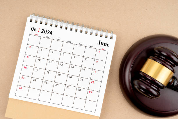 istock Desk calendar for June 2024 and judge's gavel. 1978928517