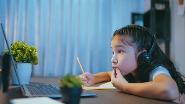 istock Girl doing homework at home 1978989509