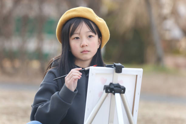 girl drawing a picture