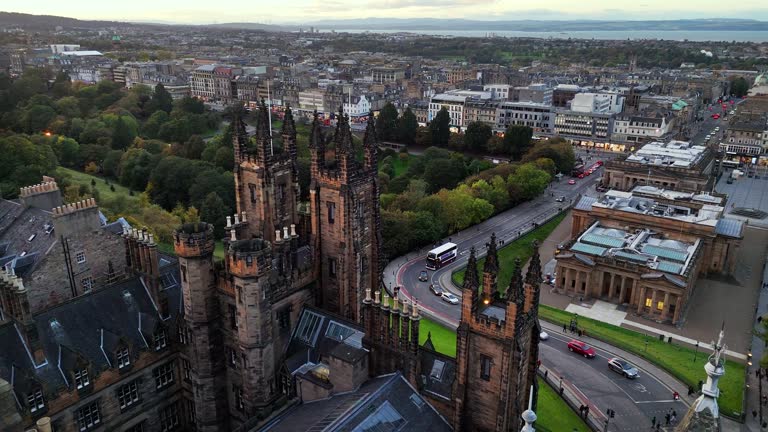 Aerial view of Edinburgh University and Edinburgh old town, Old university in Edinburgh and Edinburgh Castle aerial view, Edinburgh city centre, Gothic Revival architecture in Scotland