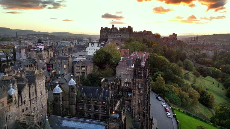 Aerial view of Edinburgh University and Edinburgh old town, Old university in Edinburgh and Edinburgh Castle aerial view, Edinburgh city centre, Gothic Revival architecture in Scotland