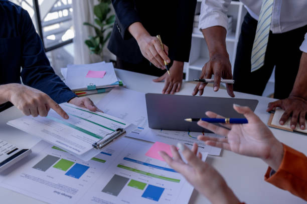 istock Team Of Business working at the office with documents on desk, planning analyzing the financial report, business plan investment, Consultant, finance analysis concept 1979093663