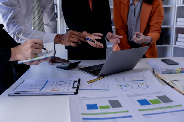 istock Team Of Business working at the office with documents on desk, planning analyzing the financial report, business plan investment, Consultant, finance analysis concept 1979094179