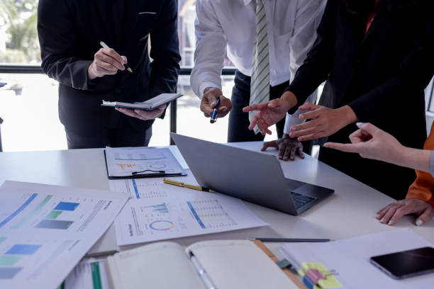 istock Team Of Business working at the office with documents on desk, planning analyzing the financial report, business plan investment, Consultant, finance analysis concept 1979094184