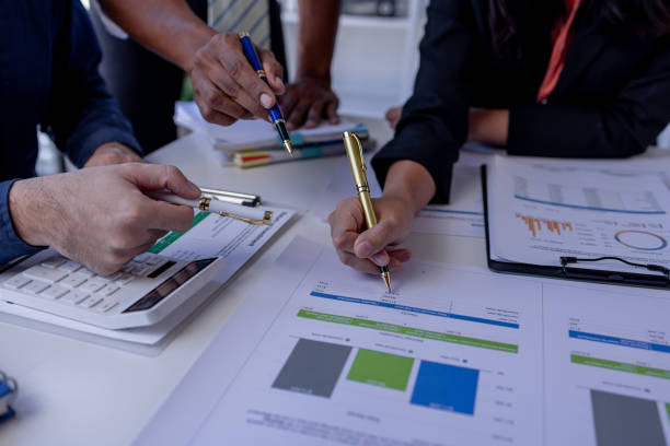 istock Team Of Business working at the office with documents on desk, planning analyzing the financial report, business plan investment, Consultant, finance analysis concept 1979102506