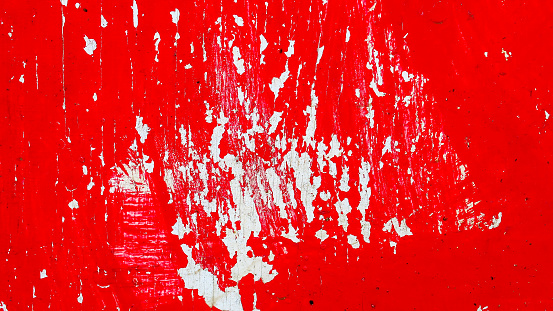 red texture with white streaks or markings. red abstract background