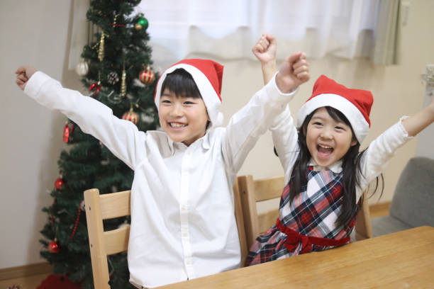 istock Smiling children Christmas image 1979144588