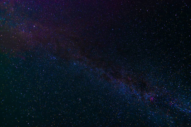 istock starry multicolored night sky with a bright milky way and galaxies 1979178430