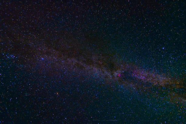 istock starry multicolored night sky with a bright milky way and galaxies 1979178954