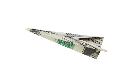 Paper airplane from the dollars. Concept for travel, business idea, leadership, success, teamwork, creative idea, vision