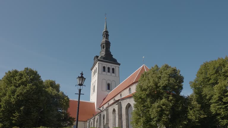 Classical European Church Steeple Against Blue Sky in Tallinn on Estonia