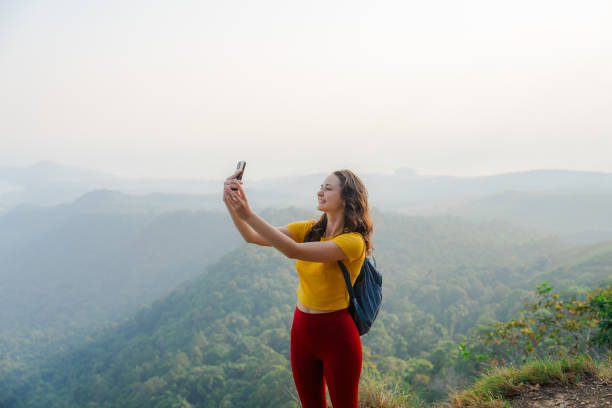 istock Woman taking selfie on the viewpoint overlooking Krabi 1979294991