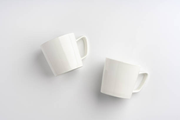 istock Blank white mugs mock up on white background 1979295225