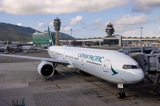 Hong Kong - September 18, 2023 : Cathay Pacific Boeing 777-300 aircraft at the Hong Kong International Airport.