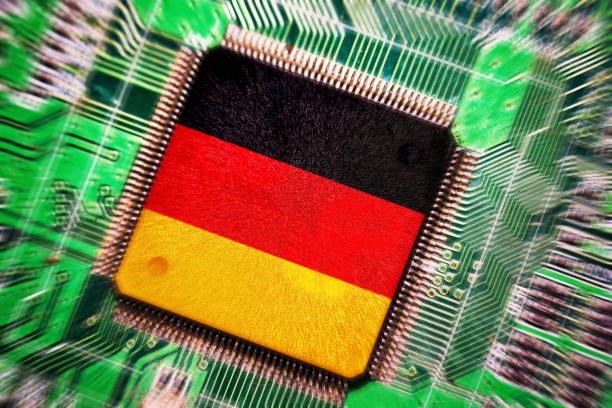 motherboard in einem computer und cpu mit deutschen flagge made in germany - made in germany stock-fotos und bilder