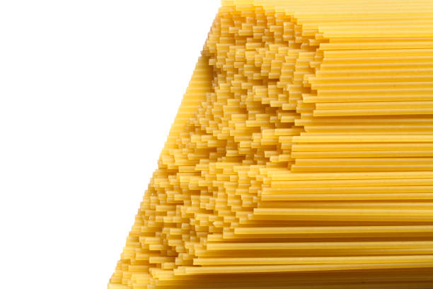 Spaghetti pasta on a white background. Spaghetti close-up. Natural pasta.