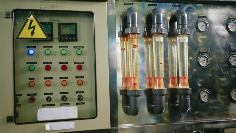 Detailed Control Panel and Sample Water Testing Tubes in an Industrial Water Treatment Plant