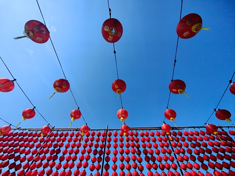 Chinese red lantern as new year symbol. Lunar holiday concept. Close up.