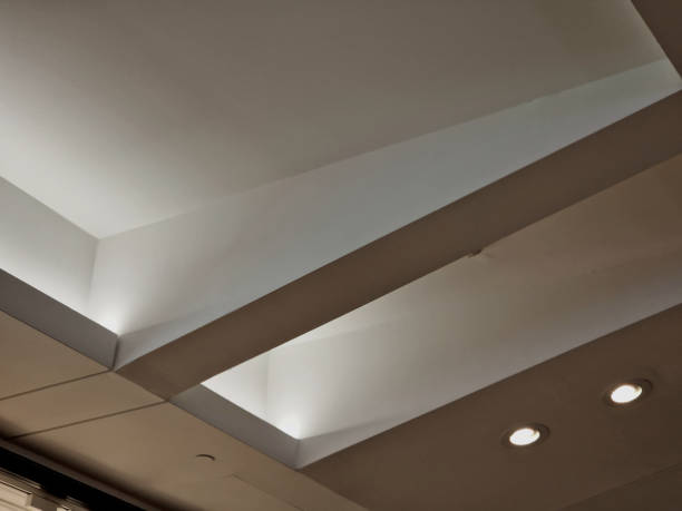 istock ceiling of the corridor in the plasterboard soffit is equipped with light halogens illuminating the ramp on the stage or in the shop. the goods look better if there are strong lamps in the ceiling 1979436923