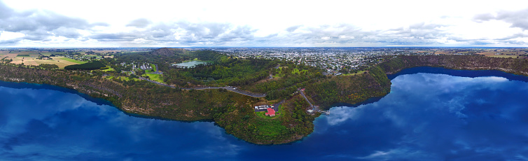 Panoramic Aerial view of Blue Lake is a large, monomictic, crater lake located in a dormant volcanic at Mount Gambier in the Limestone Coast region of South Australia.