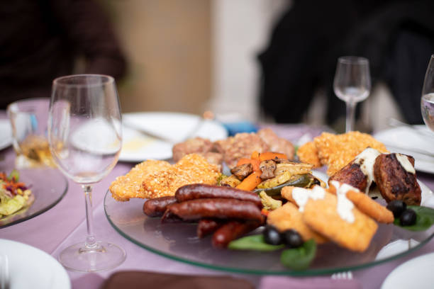 istock Elegant dinner - breaded meat, grilled sausage and souse 1979485023