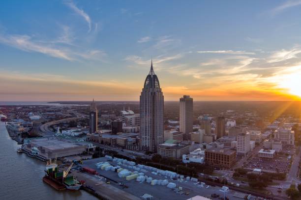 istock Downtown Mobile, Alabama riverside skyline at sunset 1979523488