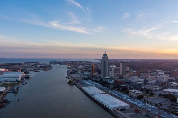 istock Downtown Mobile, Alabama riverside skyline at sunset 1979524032