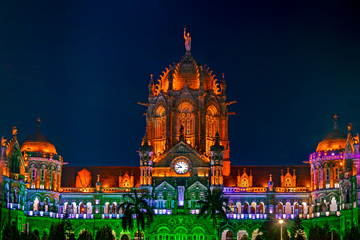 UNESCO heritage building of `Chatrapati Shivaji Maharaj Terminus` railway station specially illuminated like tricolor Indian flag .