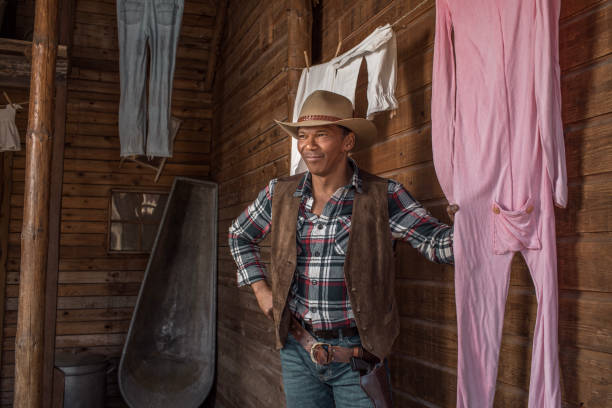 istock Handsome Black Cowboy in an authentic wild west setting 1979589358