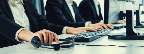 istock Call center wearing headset working in office for customer support oratory 1979602008