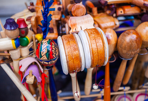 Various classic traditional children's toys are sold at street vendors on Jl. Malioboro, Jogjakarta, Indonesia. These toys are home industry production.