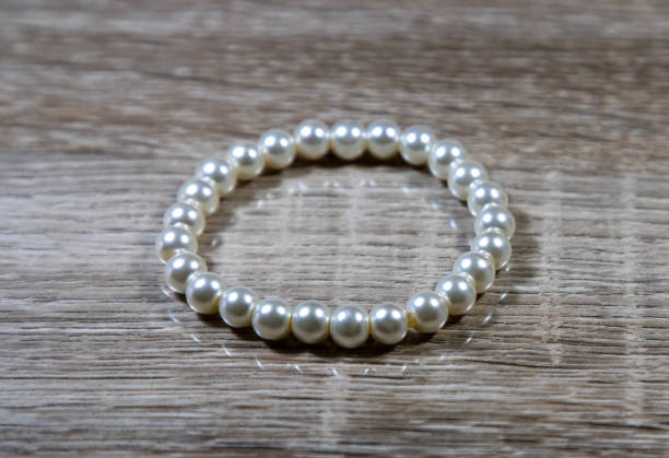 A close-up with a natural pearl bracelet