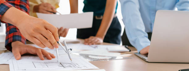 istock Architect team discuss about blueprint design at meeting room. Delineation. 1979637206
