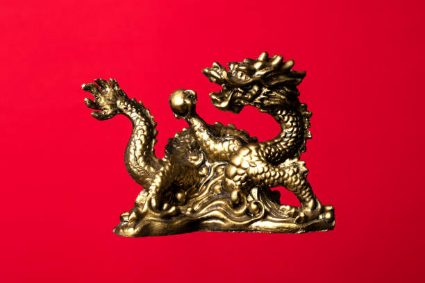 Dragon on a red background. Symbol of the Chinese New Year. stock photo