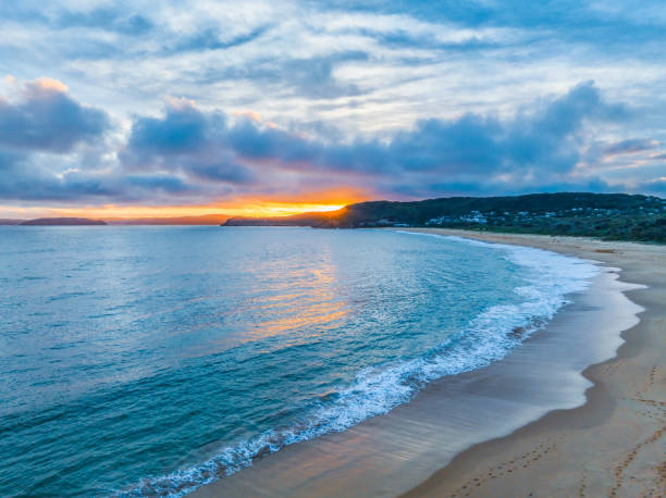 istock High cloud sunset over the sea and beach 1979644153