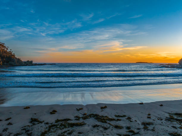 istock Sunrise at the seaside with high clouds 1979648341