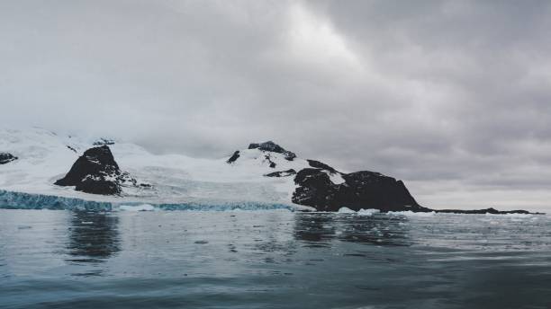 istock Antarctica Coastal Glacier Tongue and Mountain Range 1979663218
