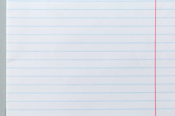 istock Sheet of exercise book with lined paper and red margin 1979666948